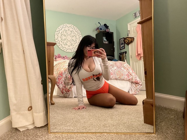 Hooters waitress in her bedroom